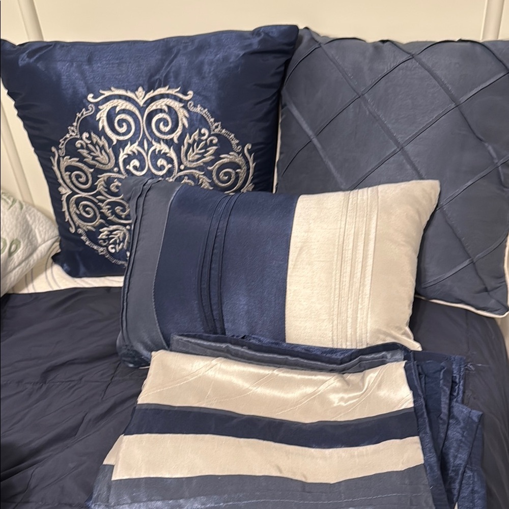 Blue and gray accent pillows